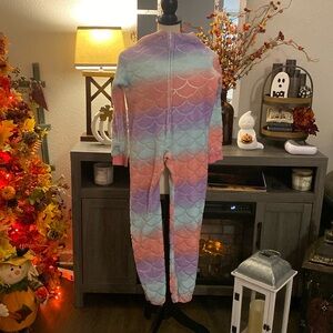 Blue, purple, and pink onesie kids size: M